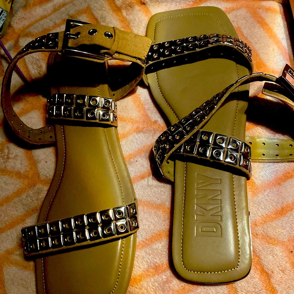 Brand new DKNY sandals, size 10. Worn once in house, take these beauties home!